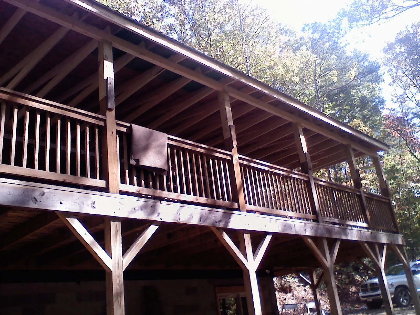 Timber framing under a new elevated porch and deck — Roof Leak Repair in West Linn by Roofing Brothers